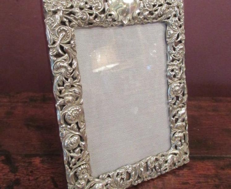 Late Victorian Cherub Decorated Silver Photo Frame - Image 1