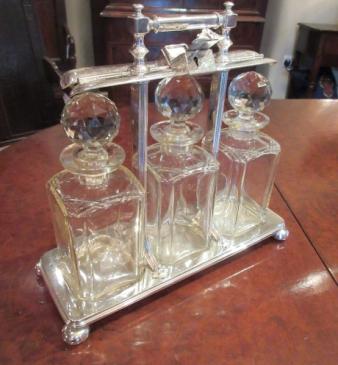 Fine Late Victorian Silvered Three Bottle Tantalus