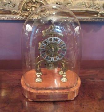 Mid Victorian Single Fusee Inlaid Base Skeleton Clock