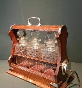 Victorian Oak and Silver Plate Three Bottle Tantalus
