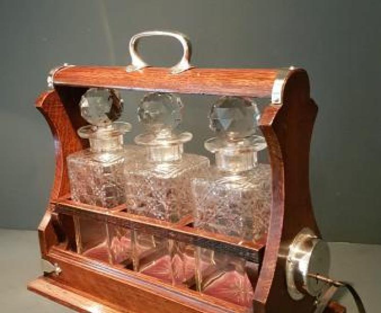 Victorian Oak and Silver Plate Three Bottle Tantalus - Image 1