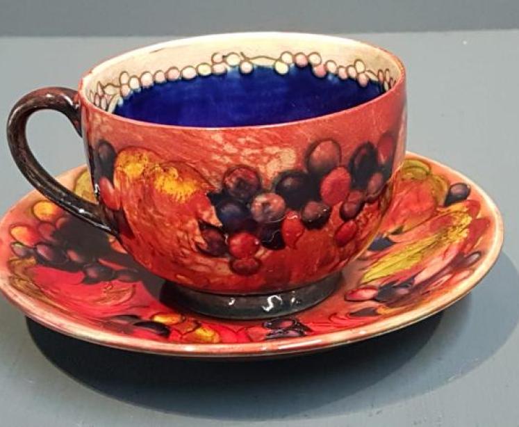 Moorcroft Leaf and Berries Flambe Cup and Saucer - Image 1