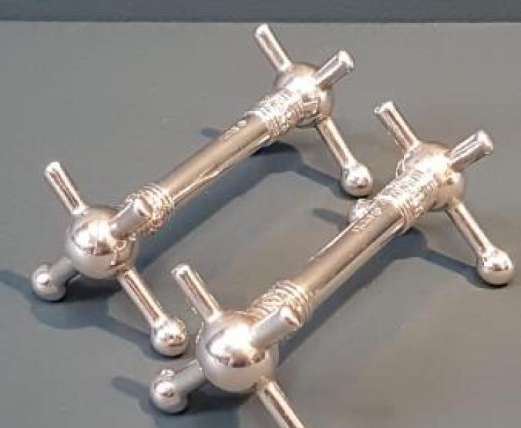 Matching Pair of Solid Silver Knife Rests - Image 1