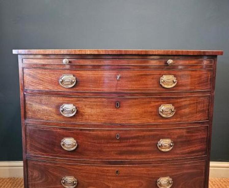 George III Mahogany Bow Front Chest with Brushing Slide - Image 1