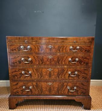 Superb Late Georgian Walnut Chest with Brushing Slide
