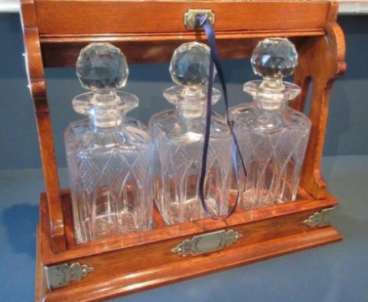 Superb Antique Polished Oak & Ebony Three Bottle Tantalus - Image 1
