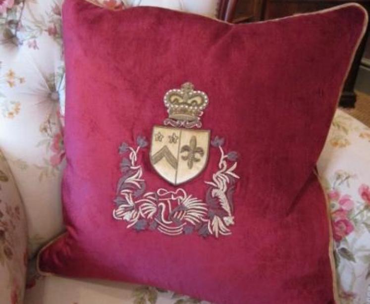 Maroon Velvet Embroidered Crest Cushion - Image 1