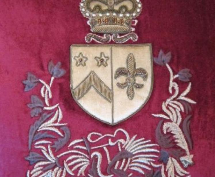 Maroon Velvet Embroidered Crest Cushion - Image 3