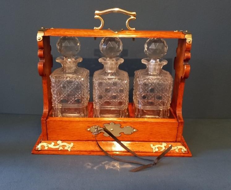 Late Victorian Polished Oak Three Bottle Tantalus - Image 1