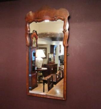 Early Victorian Figured Walnut Shaped Top Mirror