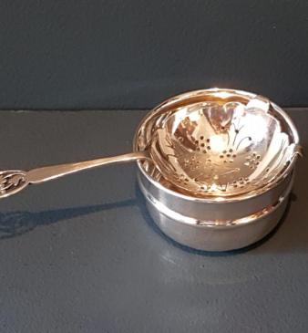Silver Tea Strainer and Saucer