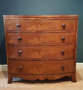 Regency Inlaid Figured Walnut Bow Front Chest