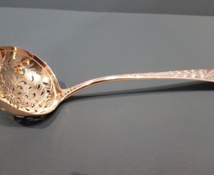 George III Silver Fretted and Gilded Ladle - Image 1