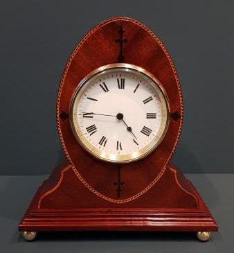 Fine Quality Elliptical Inlaid Mahogany Mantel Clock