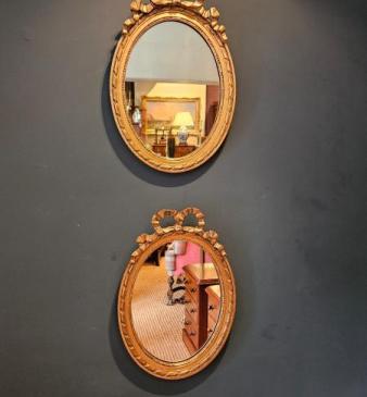 Pair of Victorian Small Oval Ribbon Pediment Gilt Mirrors