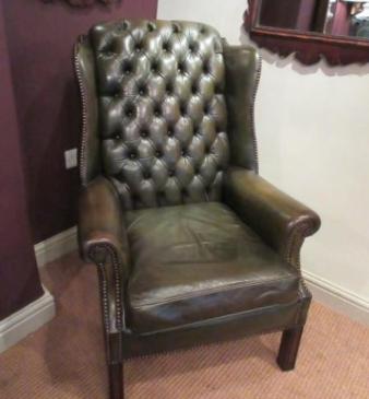 1920's Olive Green Leather Buttoned Wing Armchair